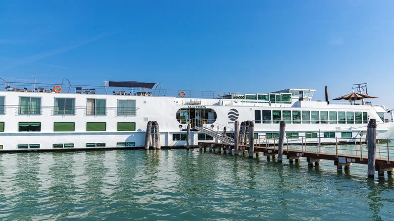 Uniworld River Cruises hotel-like cruise ship docked in Italy