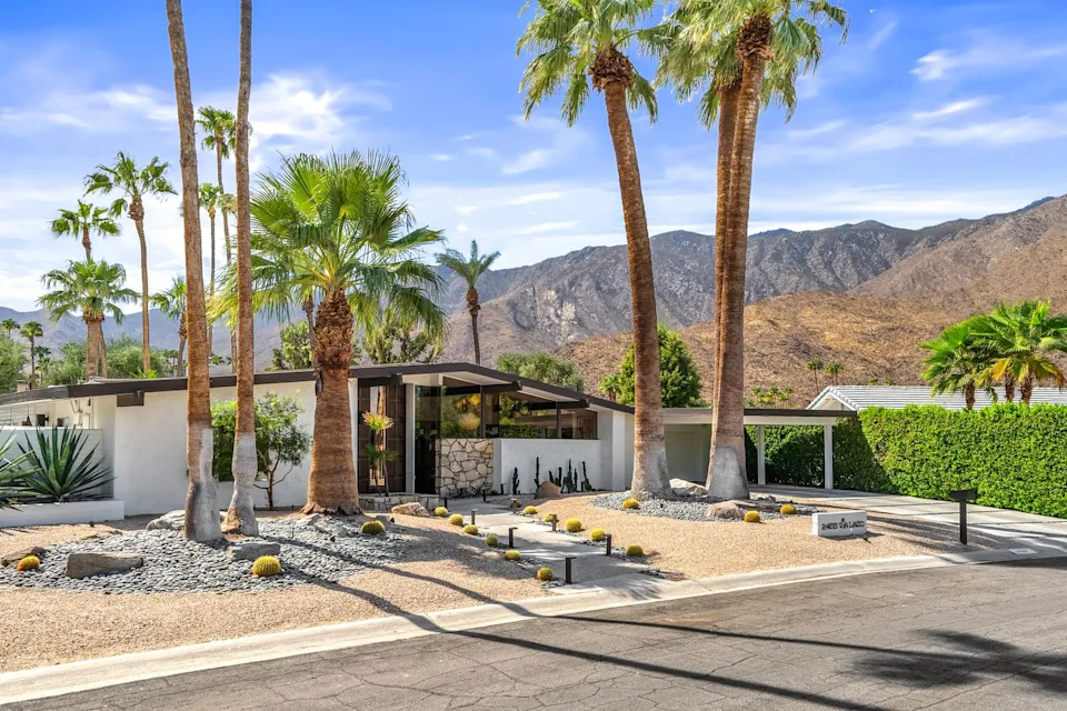 The recently renovated home has premium appliances, an outdoor shower, and dual-pane, floor-to-ceiling windows to make the most of the desert climate.