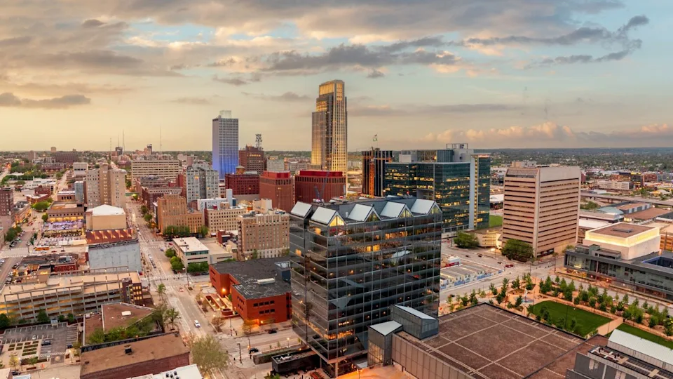 Omaha, Nebraska, USA downtown city skyline from above at dawn.