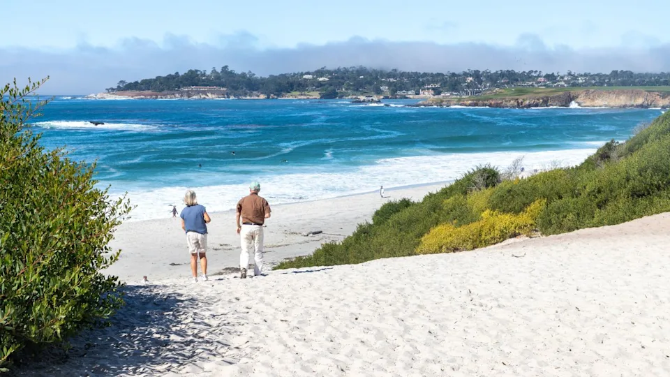 Couple watching the ocean, Carmel by the sea, Monterey, California, USA