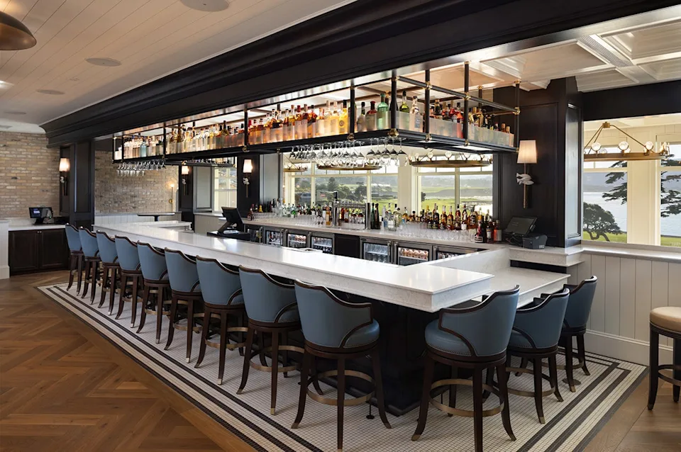 The recently renovated Stillwater restaurant at Pebble Beach Resorts in California offers floor-to-ceiling views across Pebble Beach Golf Links to the Pacific Ocean beyond.