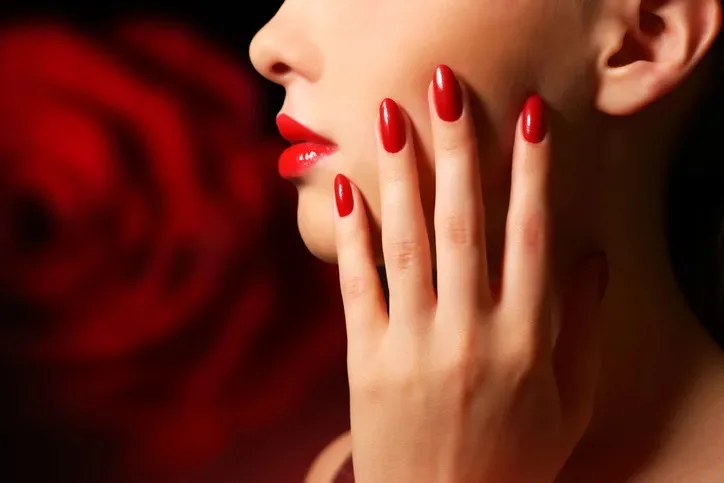 Woman with red nails.