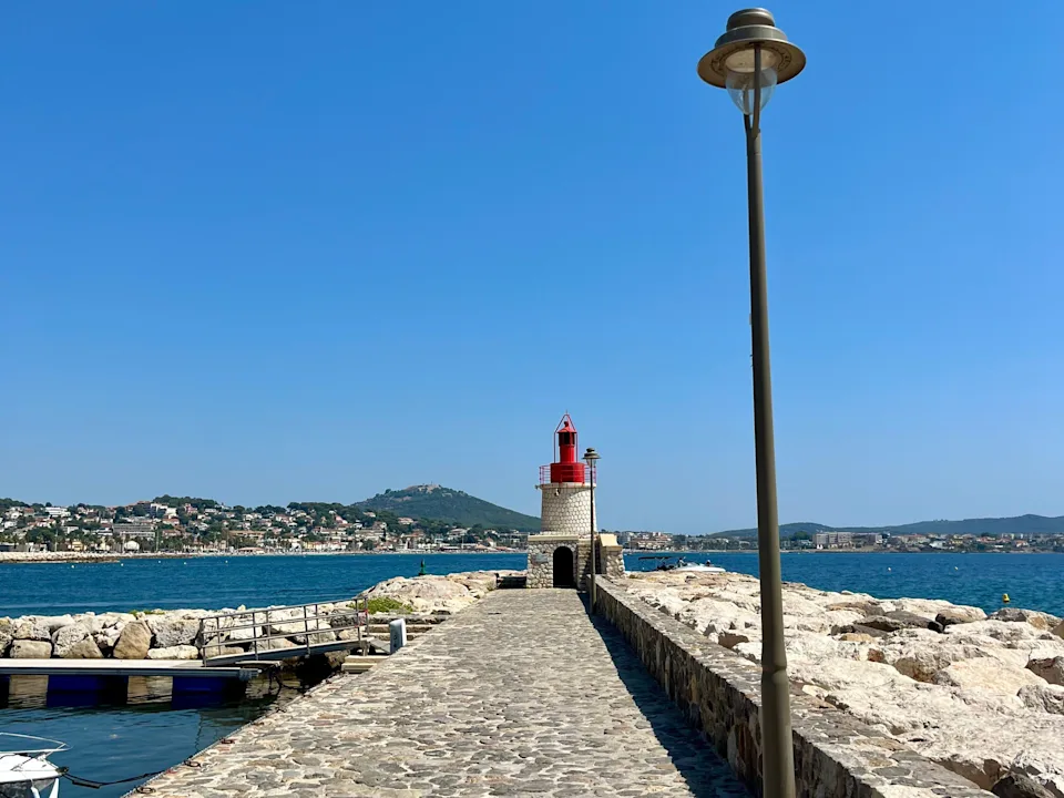 View of lighthouse at end of dock in Sanary-sur-Mer