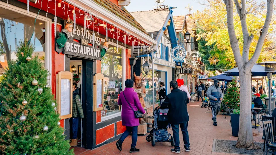 Solvang, California, USA - December 28, 2021 Christmas in Solvang. Main street, street view, and tourists in small city with traditional Danish style architecture, famous touristic destination