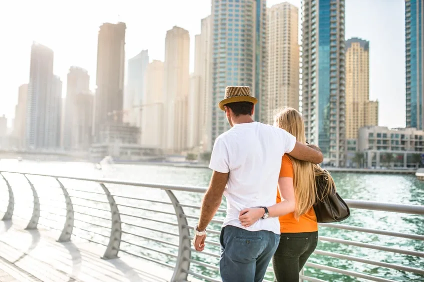 Couple walking in Dubai.