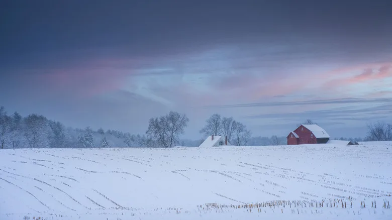 Snowy barn in rural snowfield in New Hampshire