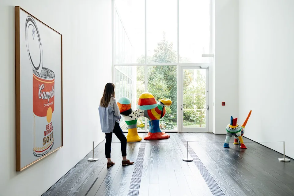 Lauren Marek/Menil Collection A hallway gallery at Houston's Menil Collection with works by Andy Warhol and Niki de Saint Phalle.