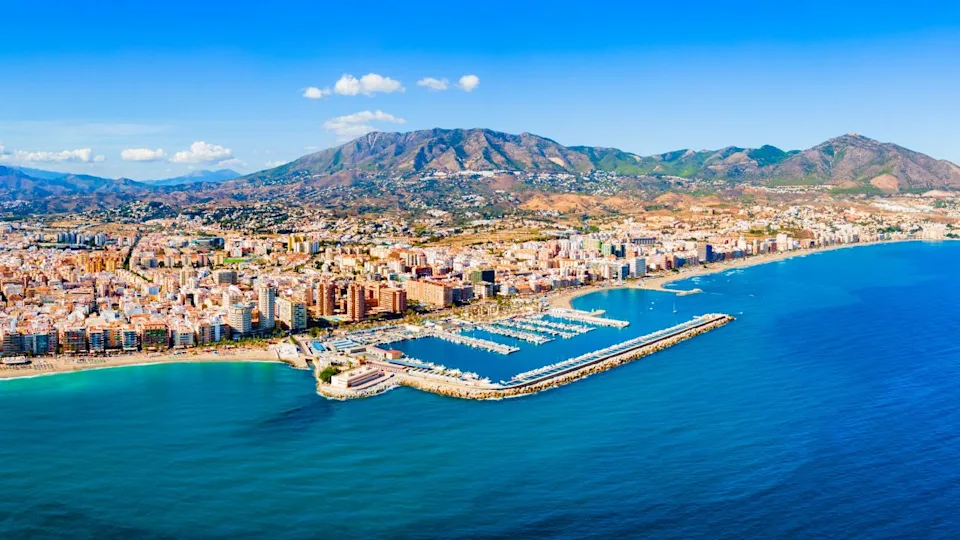 Fuengirola city beach and marina aerial panoramic view. Fuengirola is a city on the Costa del Sol in the province of Malaga in the Andalusia, Spain.