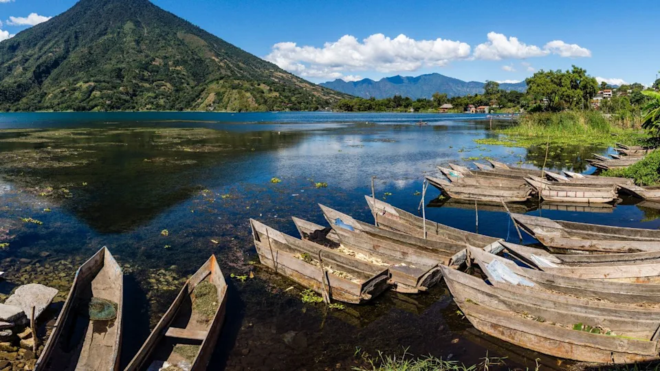 Cayucos stranded in front of the San Pedro volcano, southwest of the caldera of Lake Atitlán , Santiago Atitlán. ,Guatemala, Central America