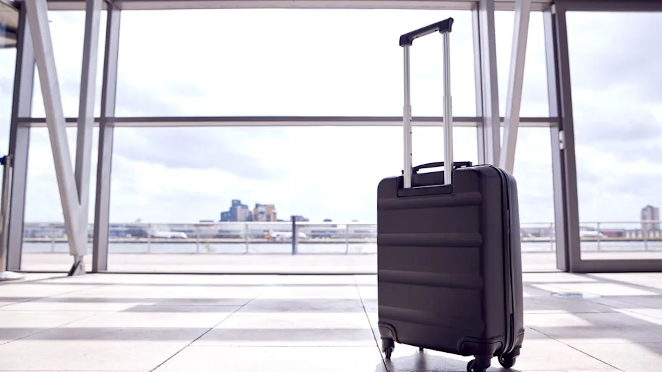 Unattended Suitcase Posing Security Threat In Airport Building