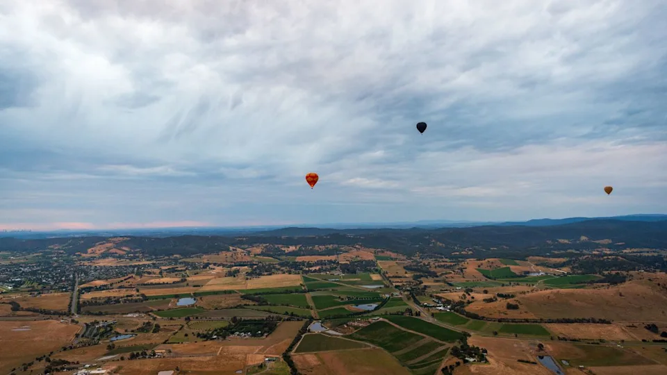 Aerial view of Yarra Valley in early morning from a hot air balloon, Victoria, Australia.
