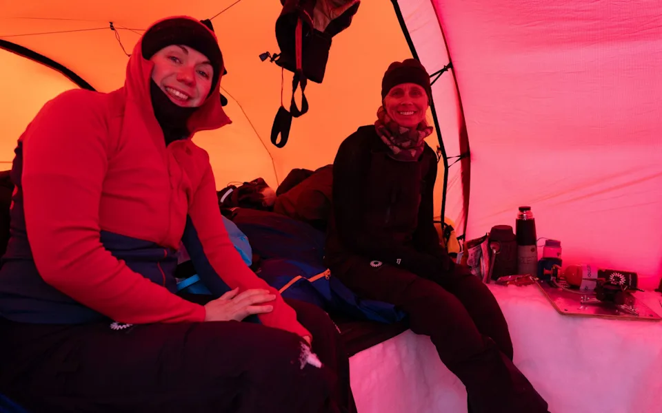 Lucy (left) with Amelia Rudd in their tent at the pit of despair