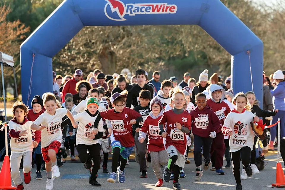 The kids run during the 1st annual West Bridgewater Youth Athletic Association Turkey Trot 5K run and walk at Friendship Park in West Bridgewater, Mass., on Saturday, Nov. 16, 2024.