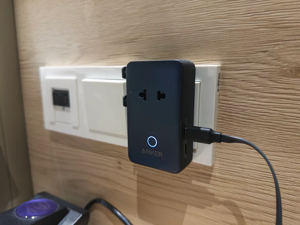 Anker Nano Travel Adapter being used in-wall.