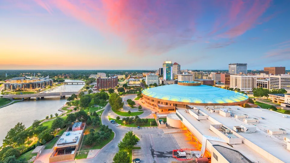 Wichita, Kansas, USA downtown city skyline at dusk.