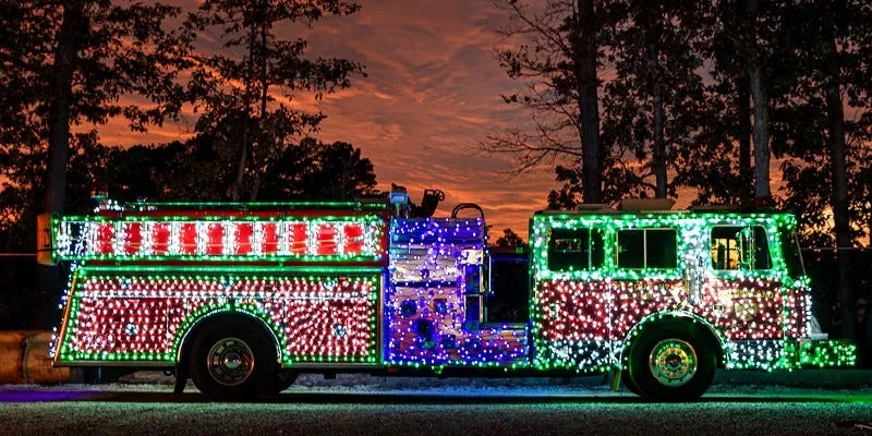 A truck is adorned with holiday lights at Diggerland USA in West Berlin.