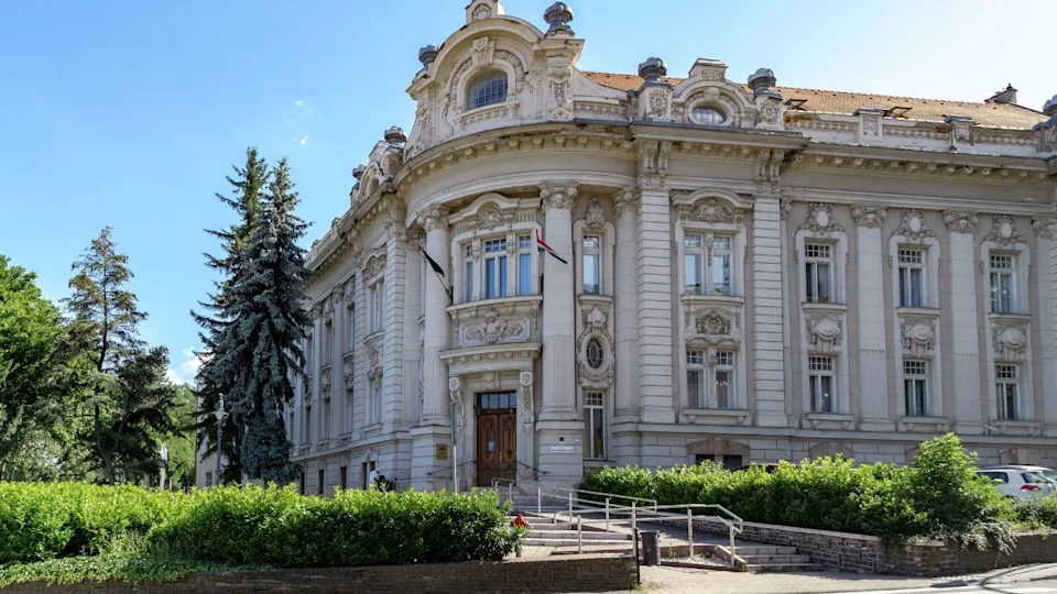 EGER, HUNGARY - MAY 27, 2024: This is the corner facade of the Baroque Treasury Building.