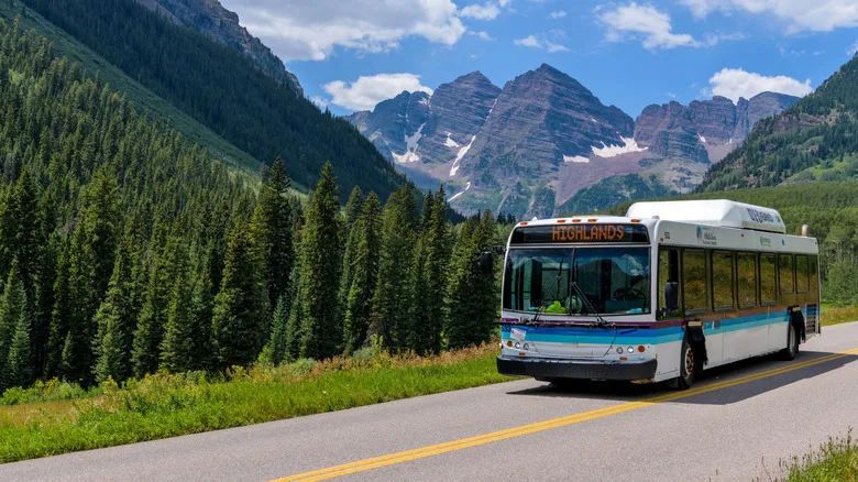 The Maroon Bells Scenic Shuttle ferries passengers to and from the most photographed place in Colorado