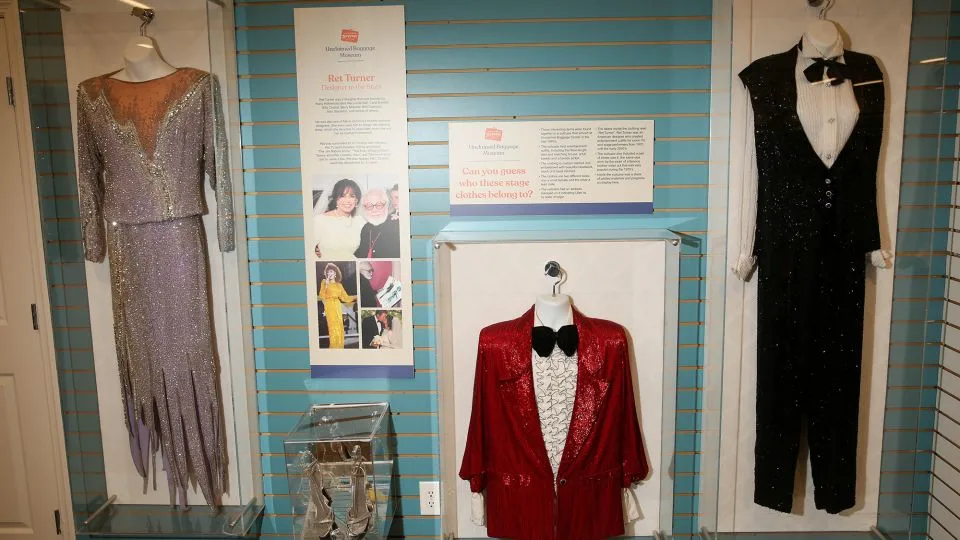 Outfits by costume designer Ret Turner are displayed at the Unclaimed Baggage store in Scottsboro, Alabama. The outfits were discovered in lost suitcases in the 1980s. - Austin Steele/CNN