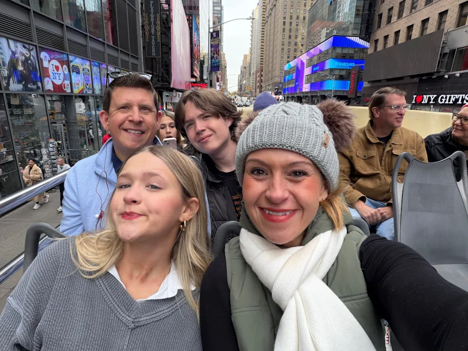 The author and her family on a bus tour of NYC.