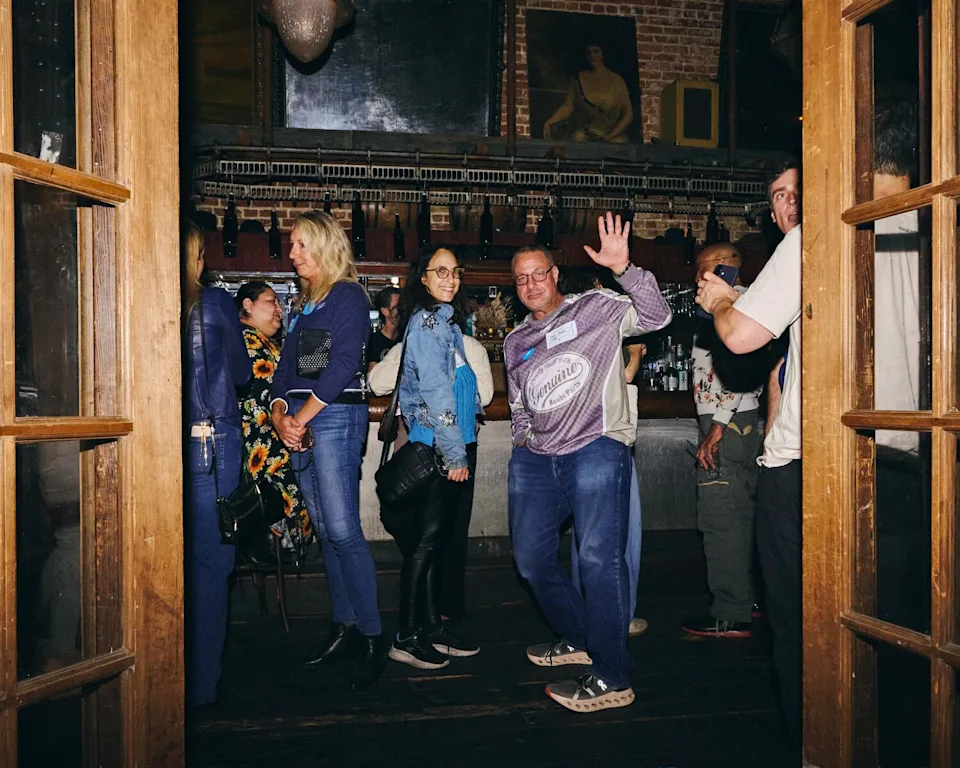 Participants mingle around the bar area during SpareRoom's "speed roommating" event at the Sassafras Saloon in Hollywood.