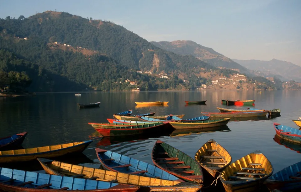 franck metois / Getty Images Phewa Lake in Pokhara provides views of the Annapurna range, making this Himalayan city Nepal's second-largest and a base for trekkers and spiritual seekers at significantly lower costs than Western mountain destinations.