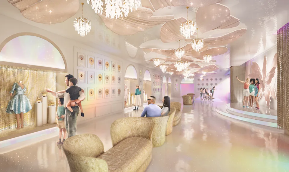 A rendering of the museum with pale, feminine colors, Dolly costumes in cases, and cream colored sofas
