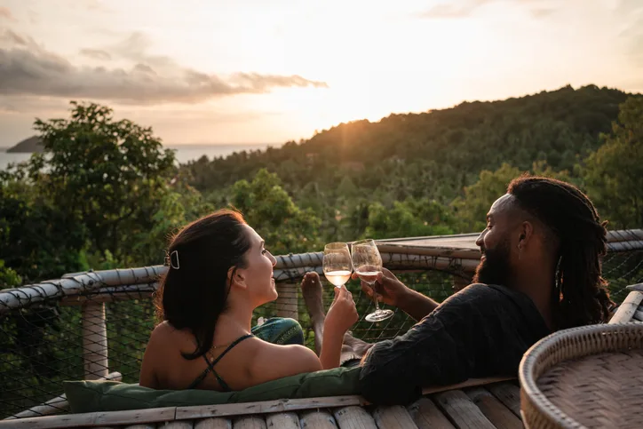 Couple enjoying a glass of wine.