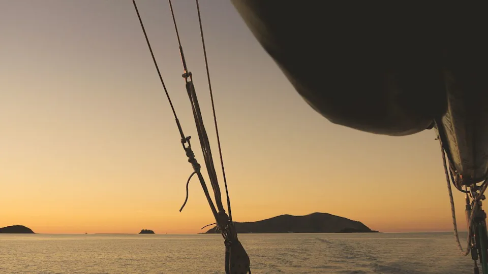 Sunset in the Whitsunday Islands as seen from a sailboat, Queensland in Asutralia