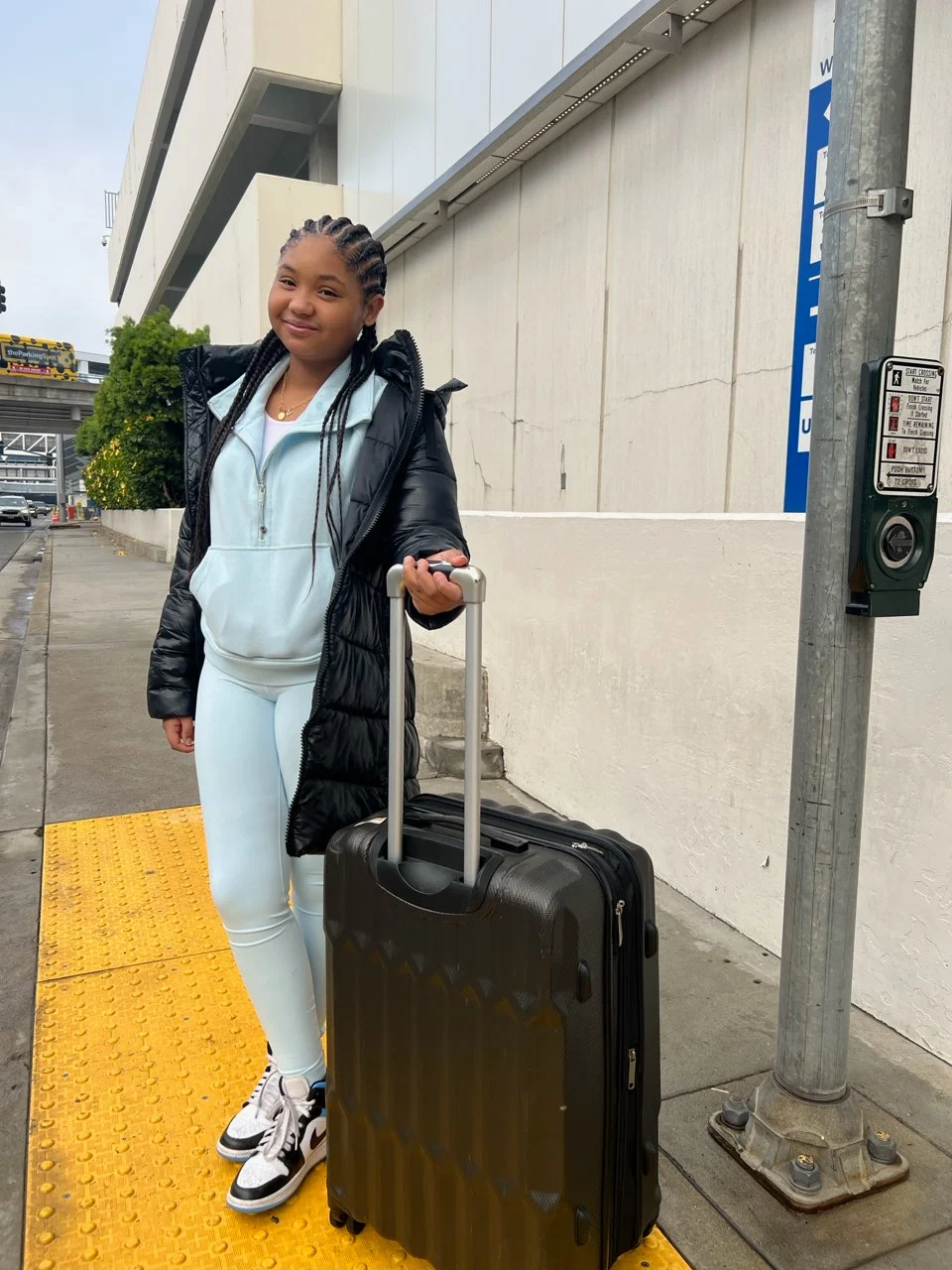 Violet with suitcase