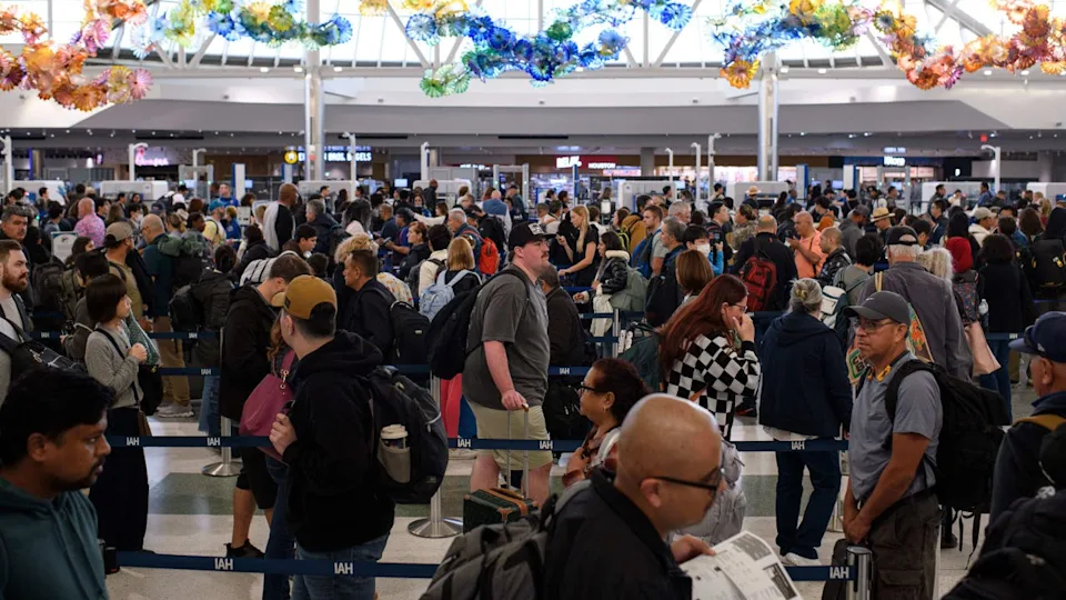 <div>Travelers wait in line at a Transportation Security Administration (TSA) checkpoint at George Bush Intercontinental Airport (IAH) in Houston, Texas, US, on Sunday, Nov. 9, 2025. Photographer: Mark Felix/Bloomberg via Getty Images</div>