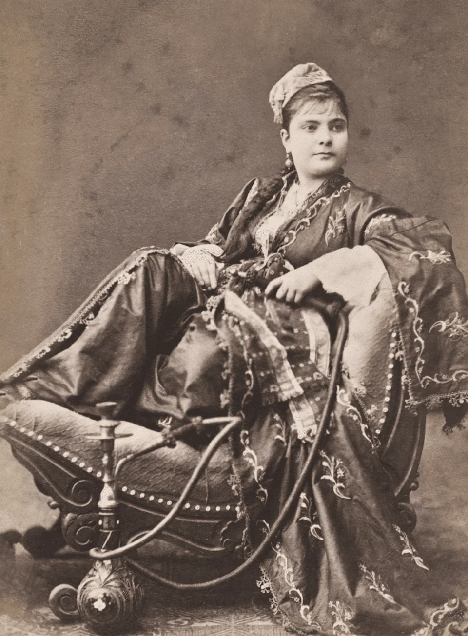 An Armenian woman indulging in hookah, photographed in the 1870s by Pascal Sébah