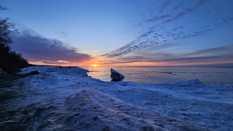 Sand and water at sunset on Lake Superior