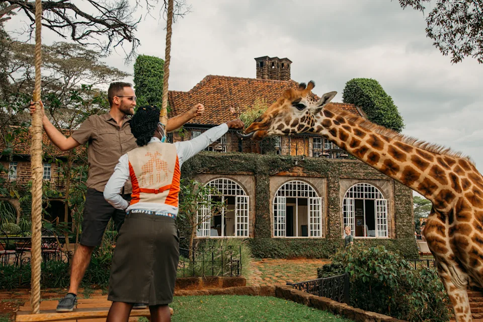 The staff at Giraffe Manor really know how to set up some fun photos!
