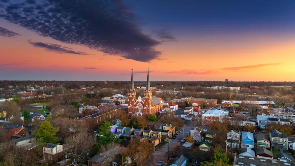 A drone view of Louiseville under a cloudy sky in the evening in Kentucky