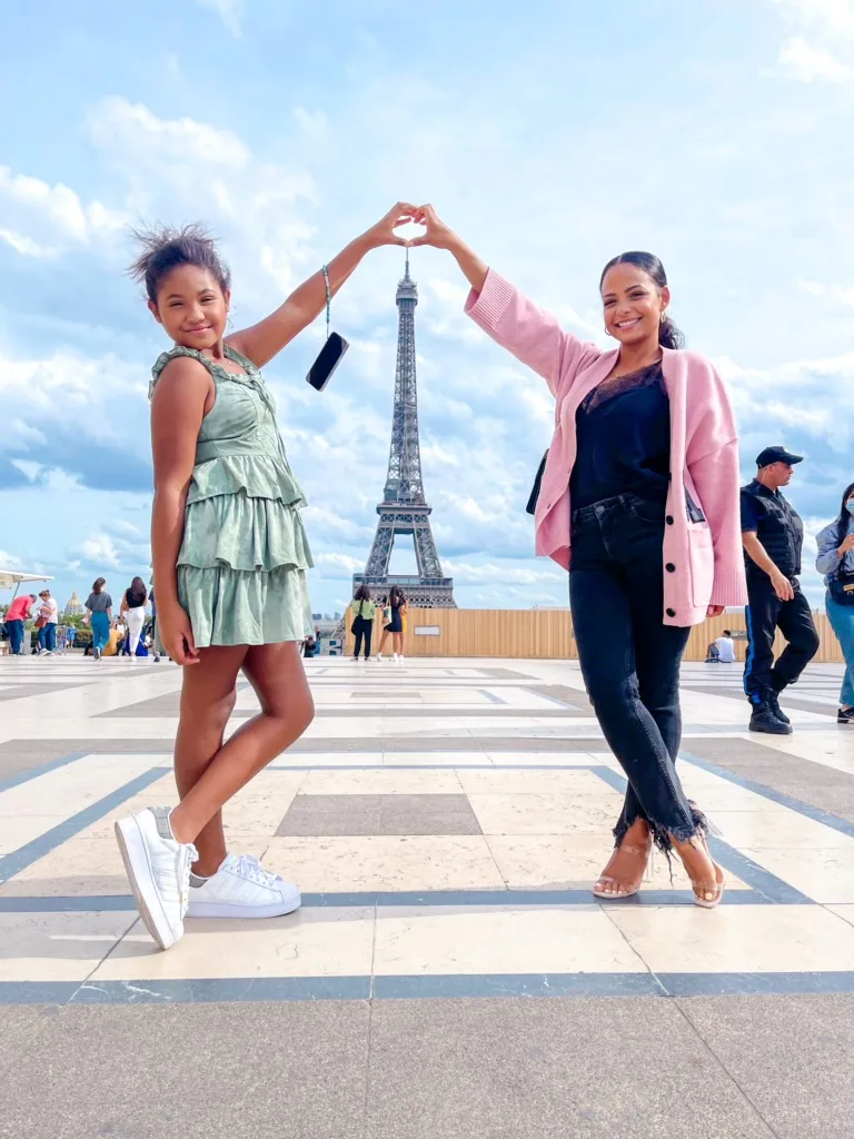 Christina Milan and daughter Violet show heart hands
