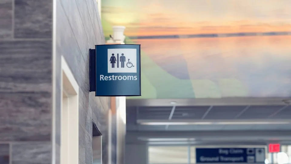 Restroom Sign in Airport Building