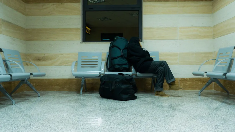 Traveler rest on a bench