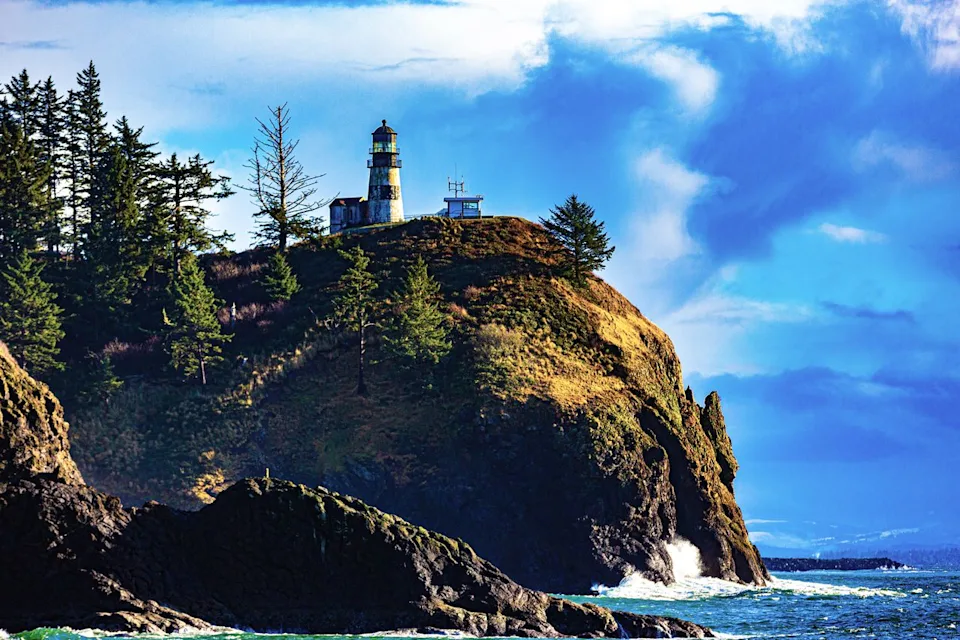 Daniel Shumny/iStockphoto/Getty Images The lighthouse at Cape Dissapointment, where the Columbia River meets the Pacific Ocean.