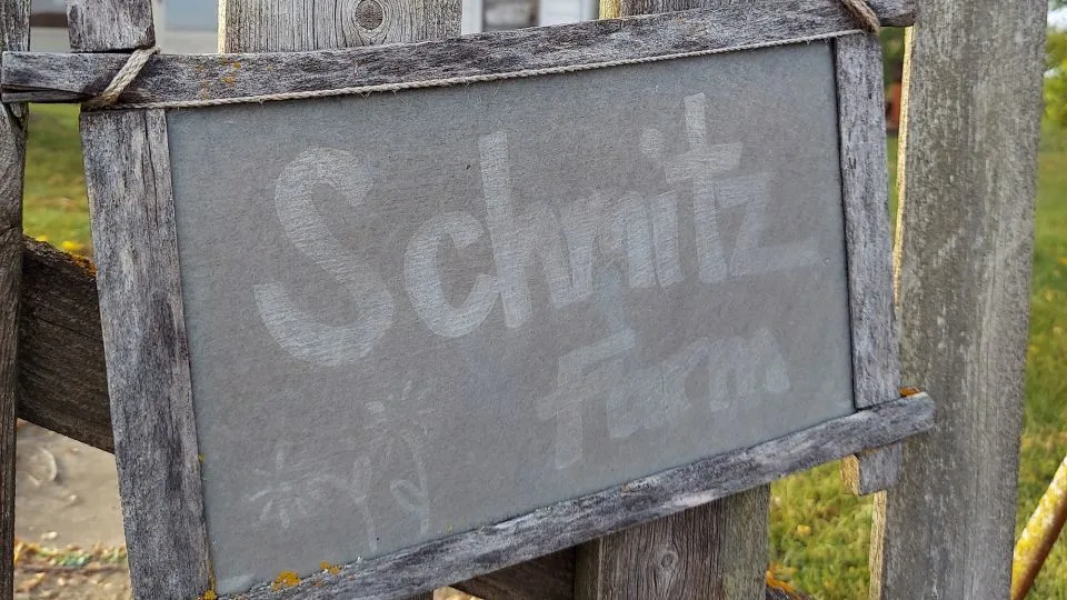 When John saw the "Schmitz Farm" sign on his return visit in 2021, he knew he was in the right place. - John Morris