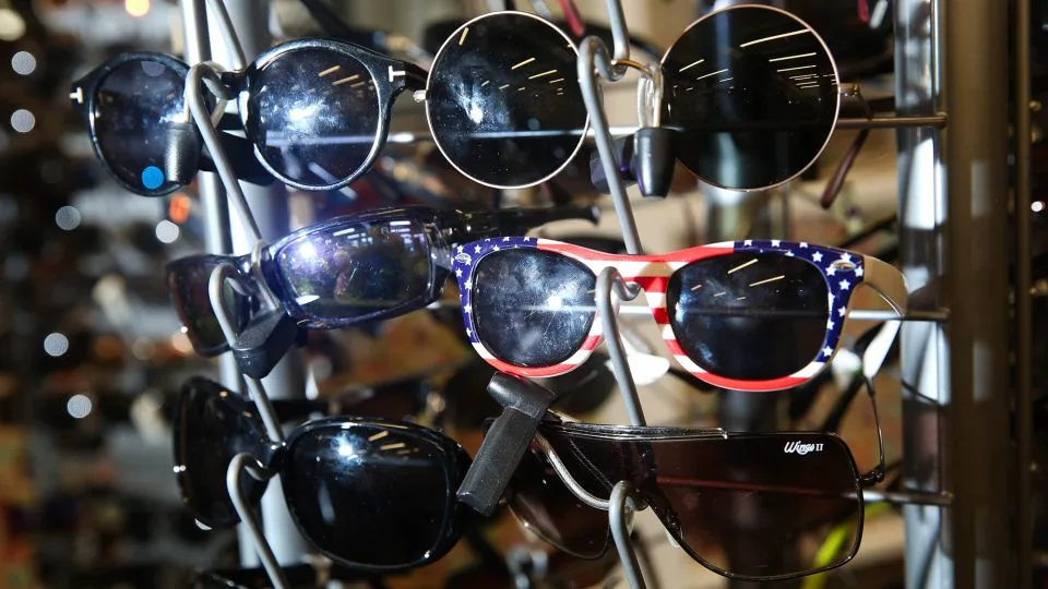 Sunglasses are among common items left in airplane seat pockets. Boxes of eyewear end up at the store. - Austin Steele/CNN
