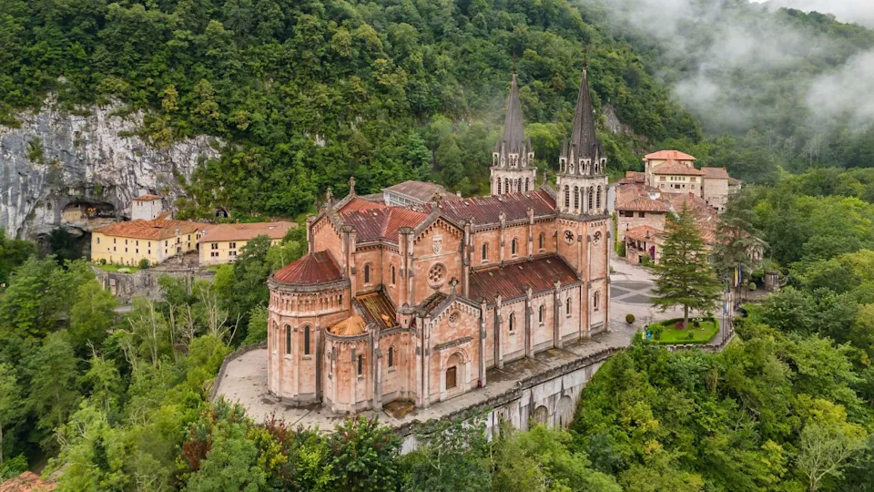 Aerial view of the Covadonga Sanctuary in Asturias, Northern Spain. Basilica de Santa Maria la Real de Covadonga, situated in the Picos de Europa mountains