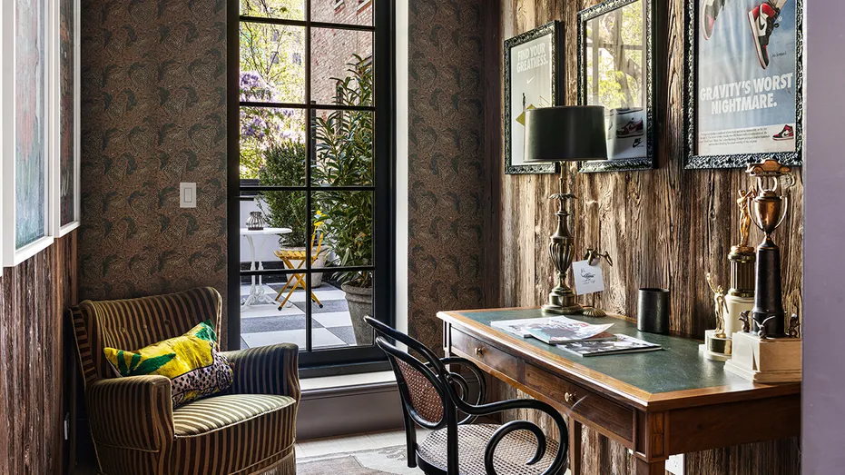 The home also features a home office with unique wallpaper.