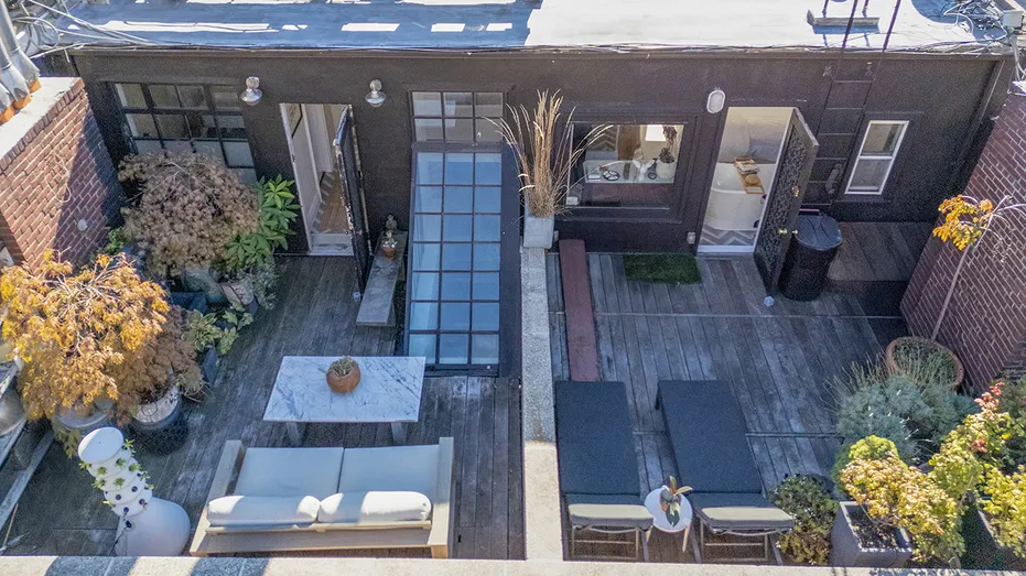 The house includes four outdoor terraces. Two in the front and two in the back.