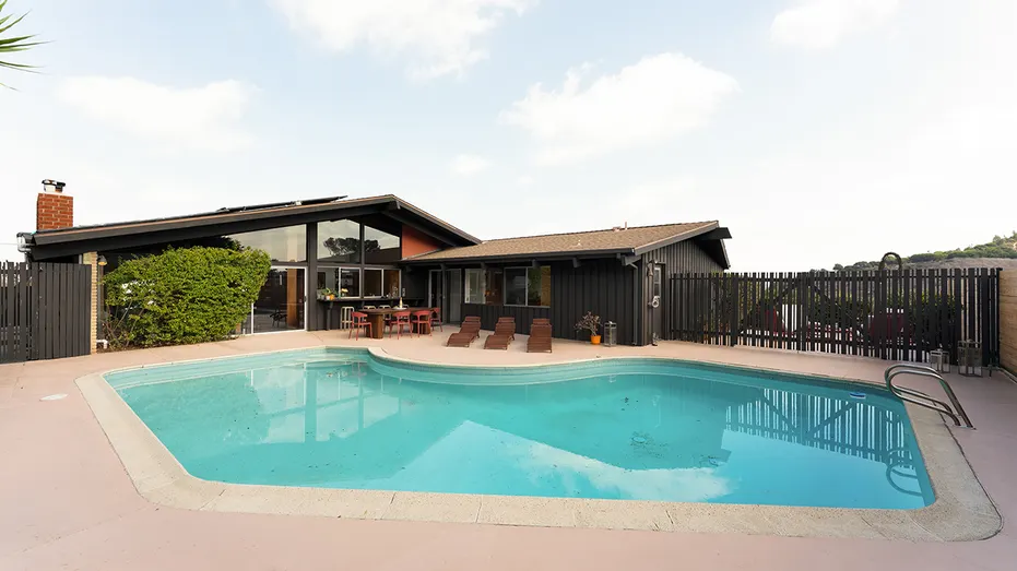 The backyard also features a large saltwater pool.