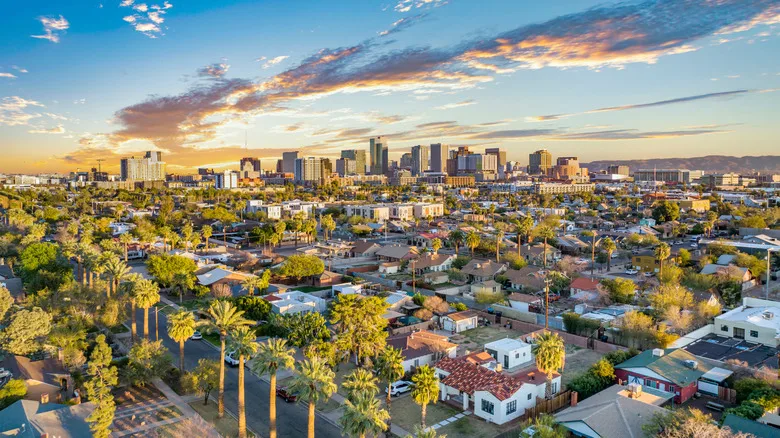 An aerial view of Phoenix, Arizona, with residential blocks in the foreground