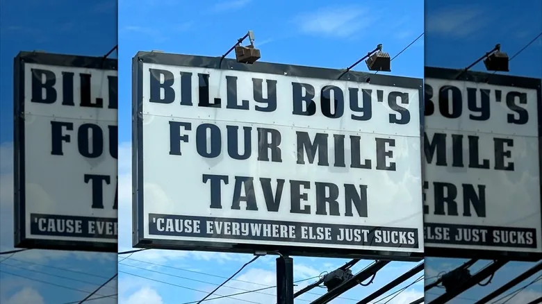 Exterior sign to Billy Boy's Four Mile Tavern, black font on white background