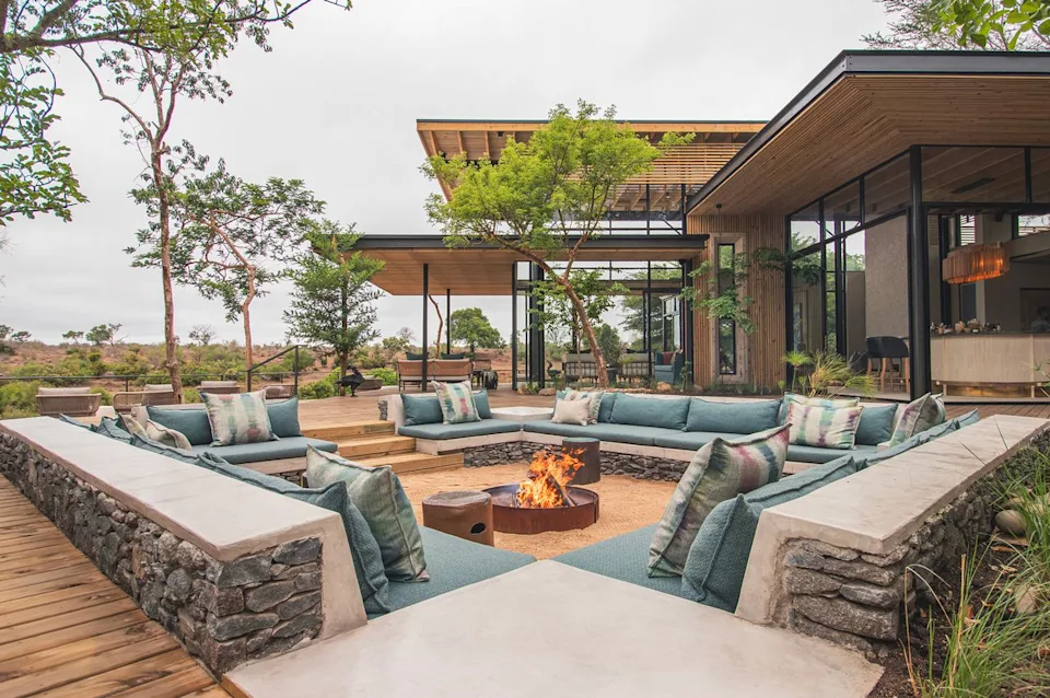 Lion Sands Ivory Lodge Relax outdoors around the firepit.
