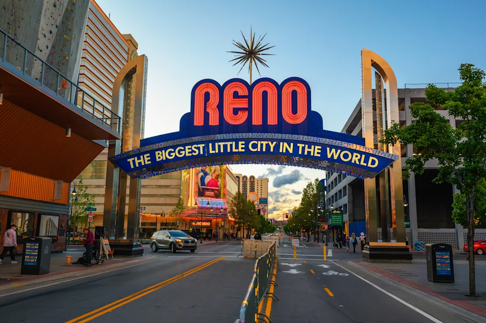 Reno, Nevada, USA - May 29, 2022 : Reno the biggest little city in the world arch sign located in downtown Reno, with hotels and casinos in the background.