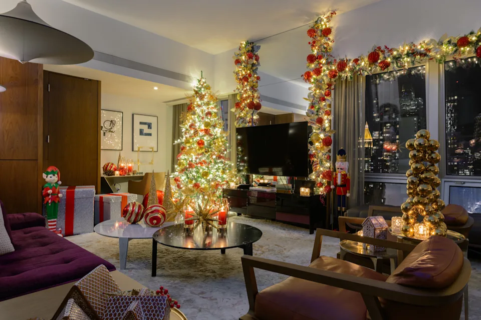 The Langham New York Nutcracker Suite decorated for the holidays with Christmas ornaments, festive lights and Nutcracker-themed details.